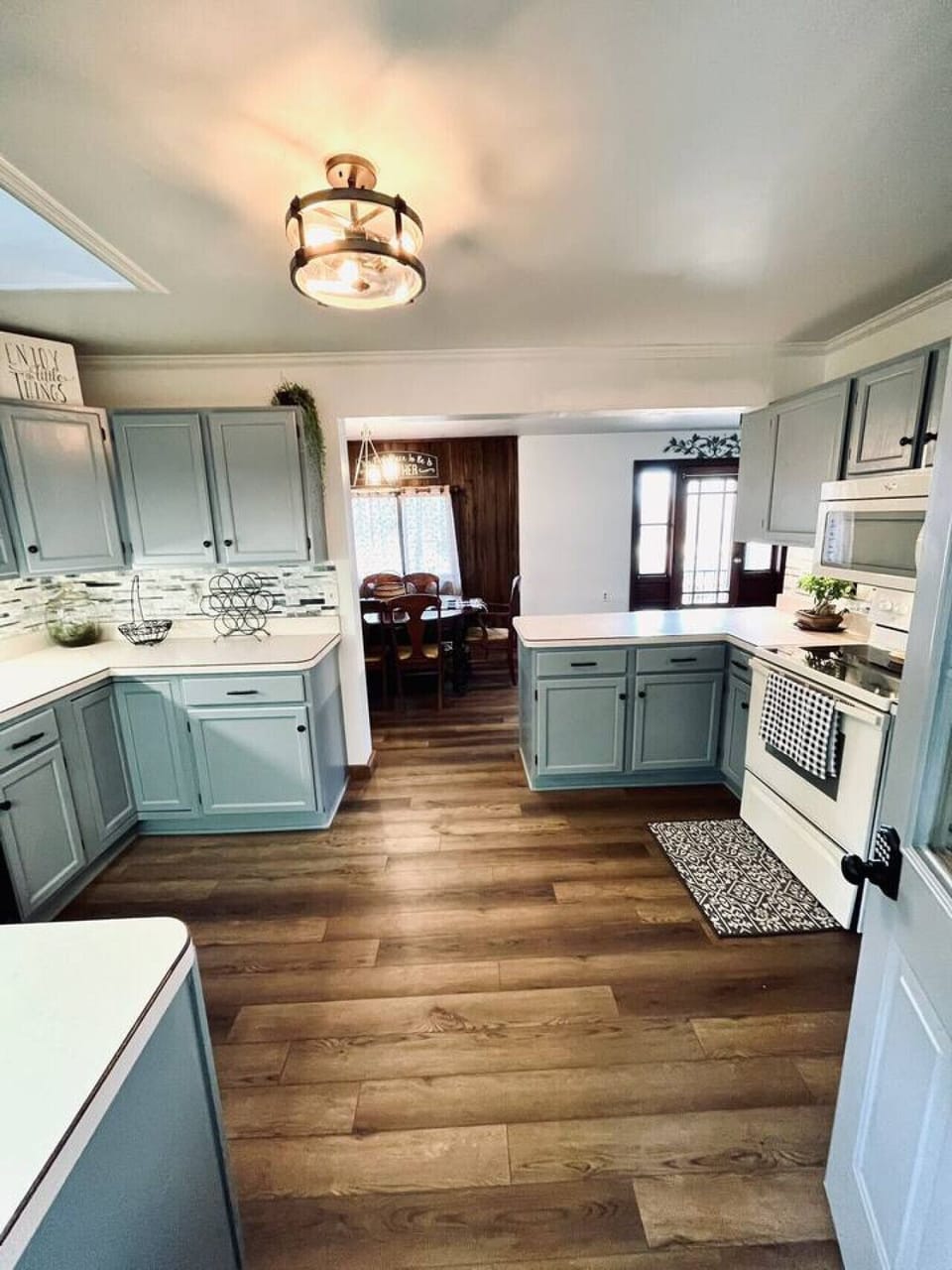 Spacious Kitchen. Has all the essentials. Pots, pans, microwave, can opener, coffee maker, blender, crock pot, and more!