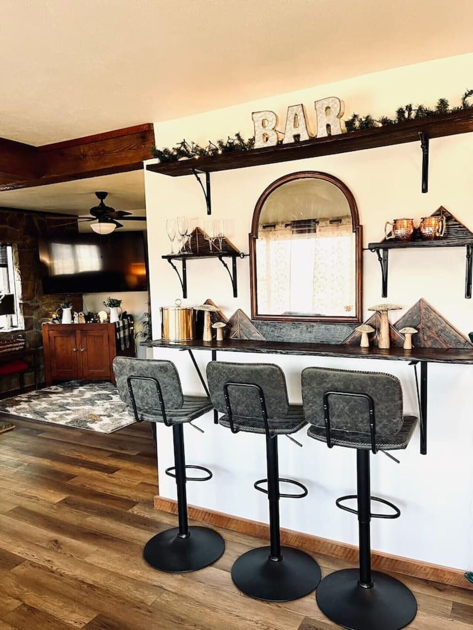 Bar with 3 seats. Perfect for a dining space for extra guests.