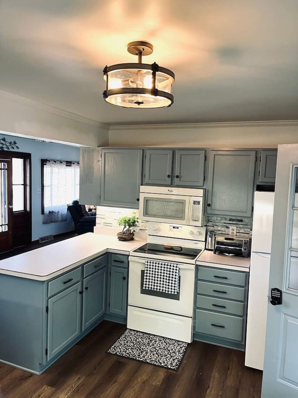 Spacious Kitchen. Has all the essentials. Pots, pans, microwave, can opener, coffee maker, blender, crock pot, and more!