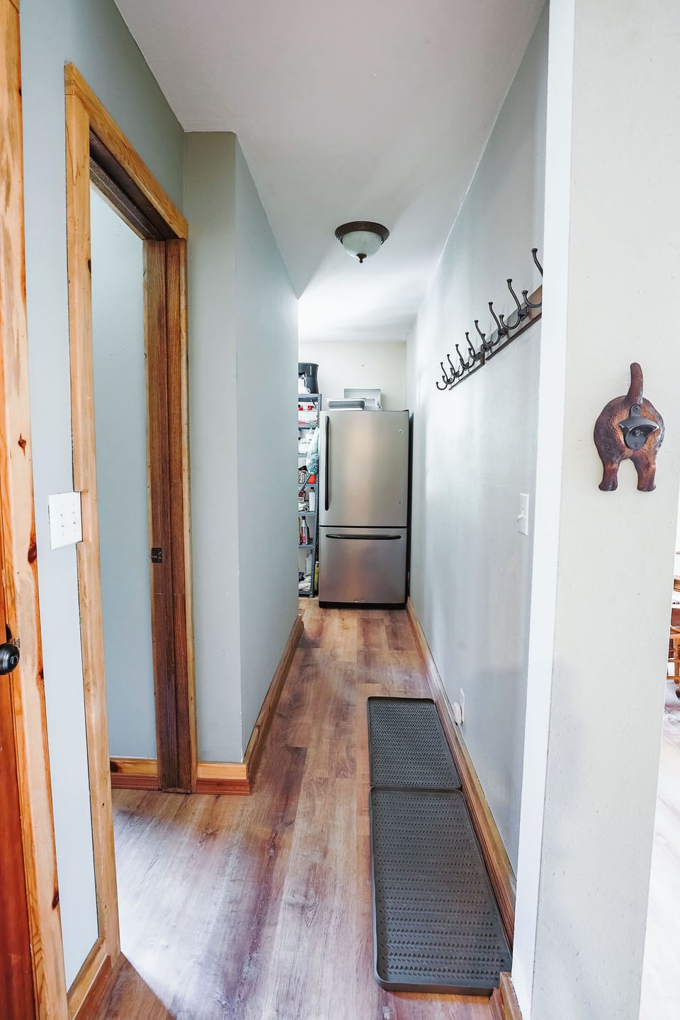 Boot + Jacket racks as well as extra fridge + laundry in the back