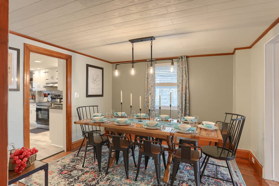 Dining table for 11? Yes, please! Centrally located where you won't miss a thing