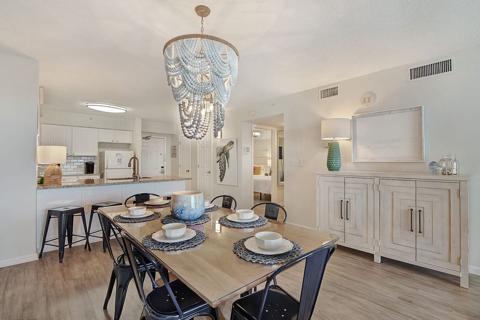 Your elegant dining area features a stunning chandelier and seats six comfortably for memorable meals together.