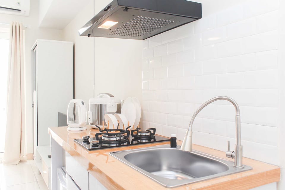 Fridge, stovetop, cookware/dishes/utensils