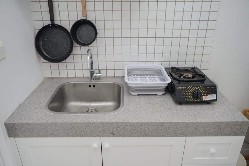Fridge, stovetop, rice cooker, cookware/dishes/utensils