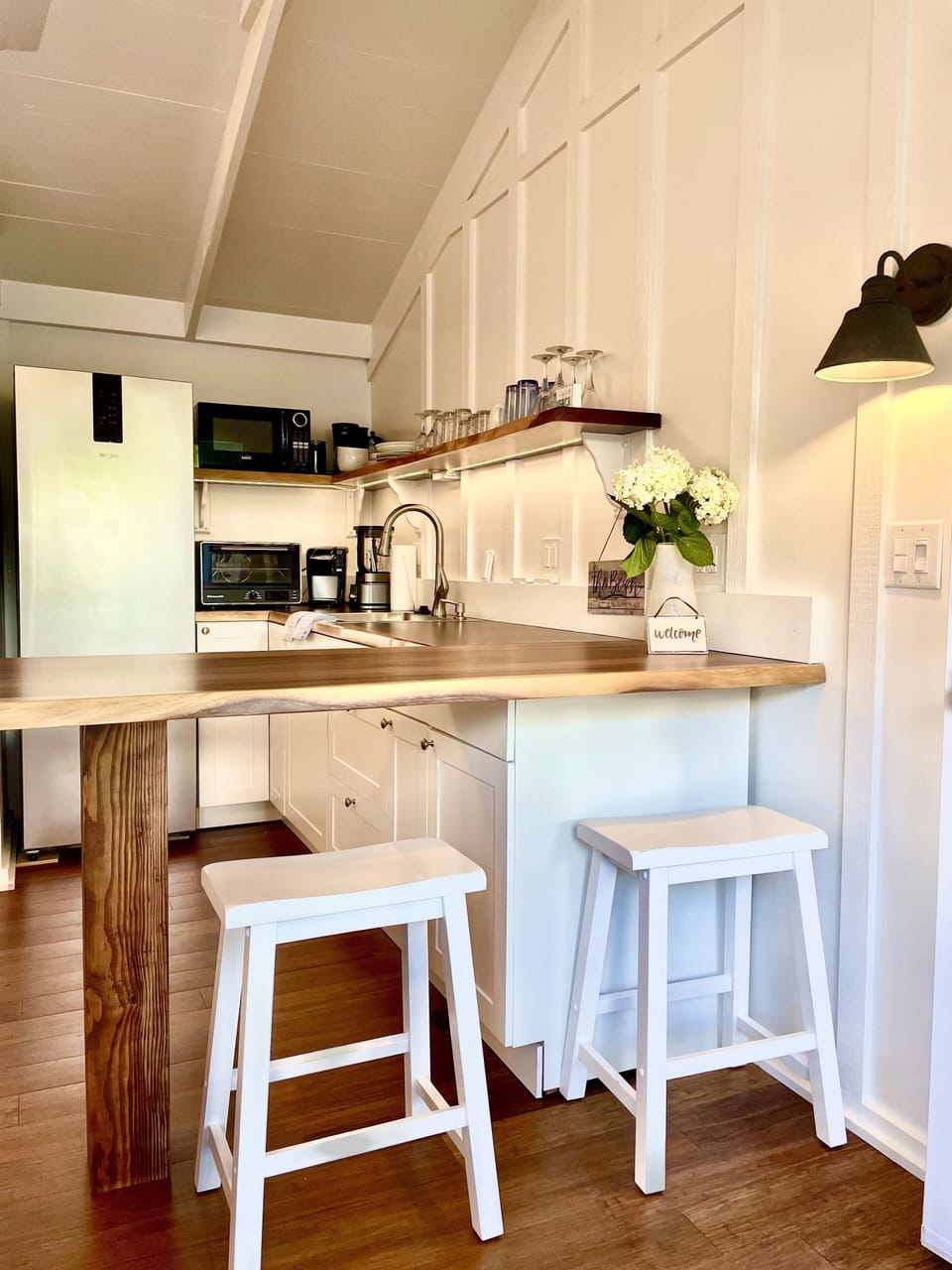 Coastal Kitchen with gentle and soothing clean lines.  Stocked with all you need
