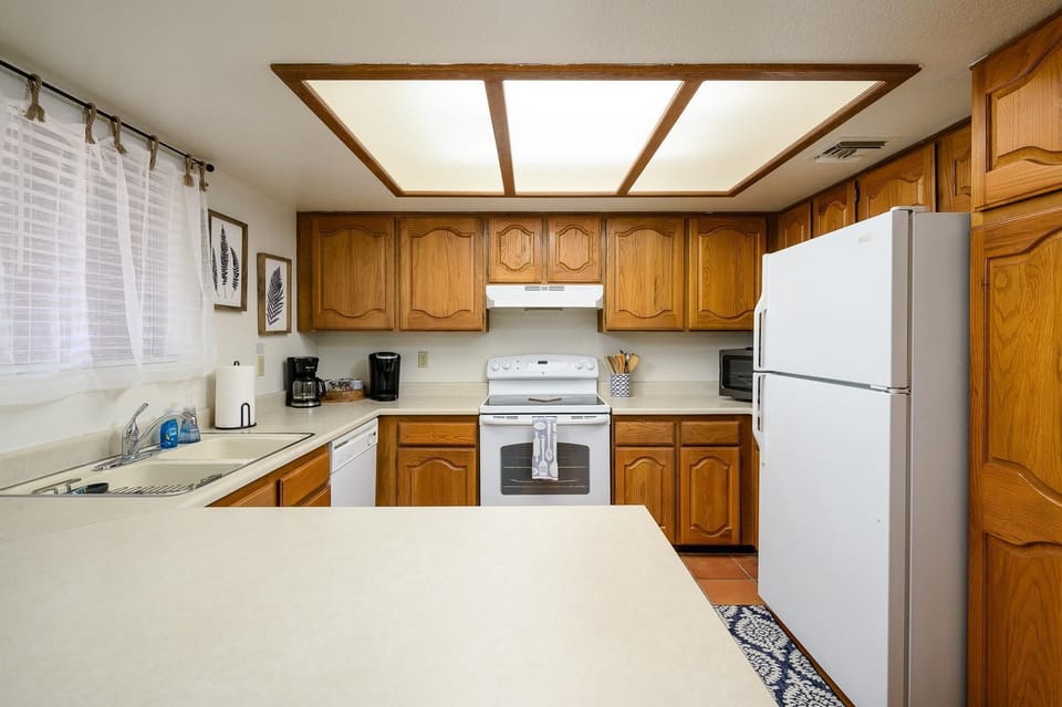 Bright, spacious kitchen with ample natural light and storage