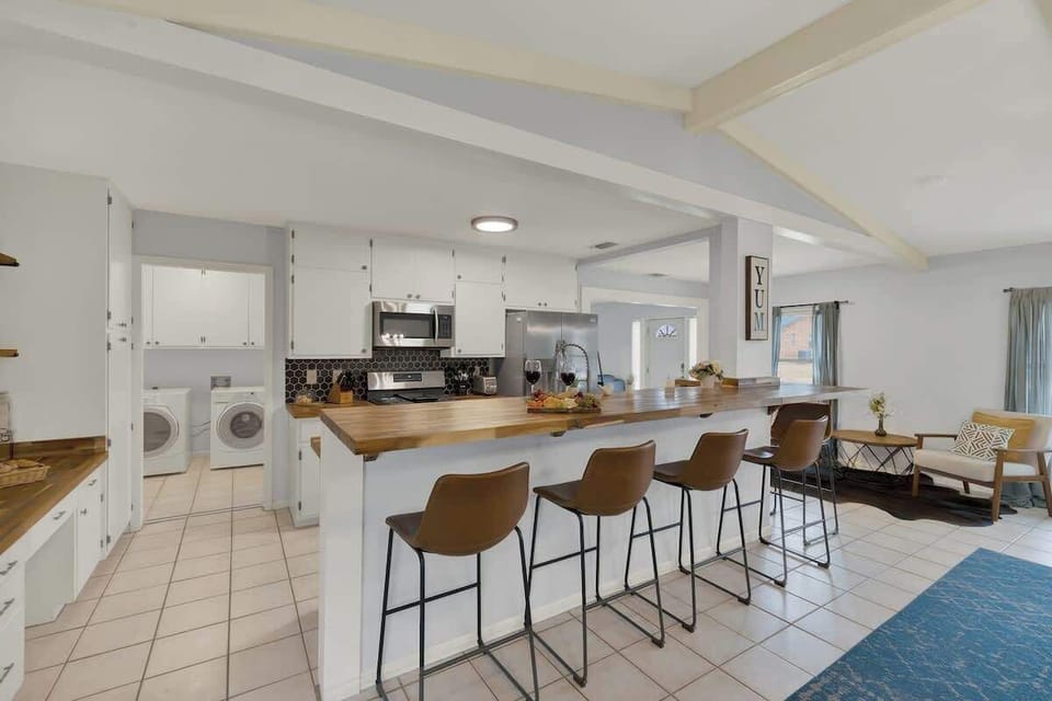 The kitchen offers ample space to prepare meals or snacks for everyone to enjoy.