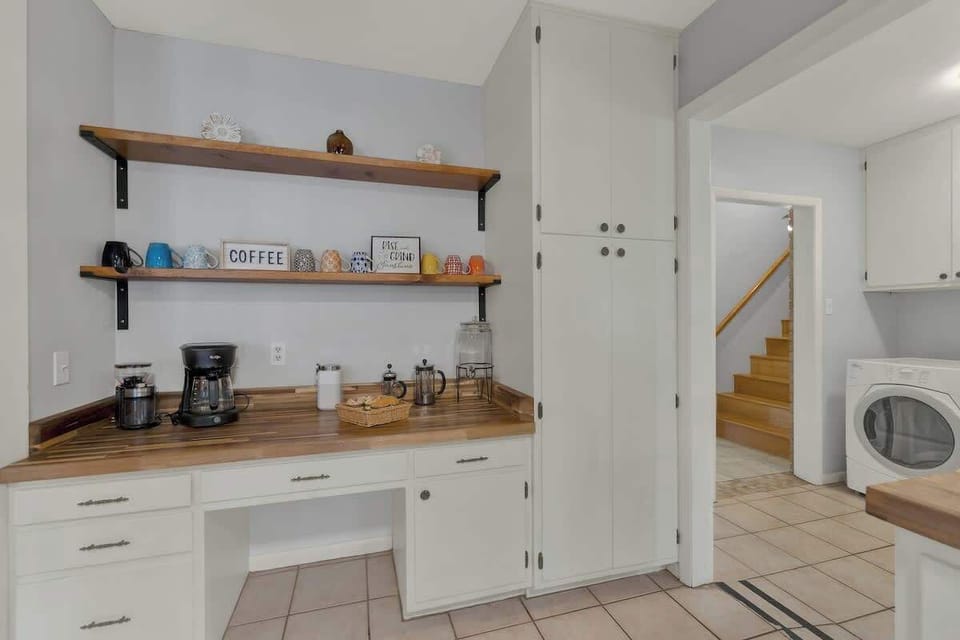 The coffee bar provides a convenient spot to brew your morning coffee and set out pastries for a quick bite before heading out for the day.
