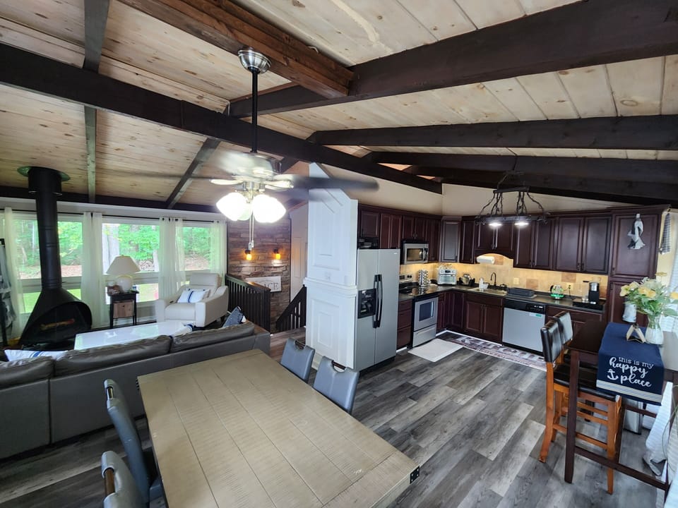 upstairs gathering spaces: kitchen, dining and living room 