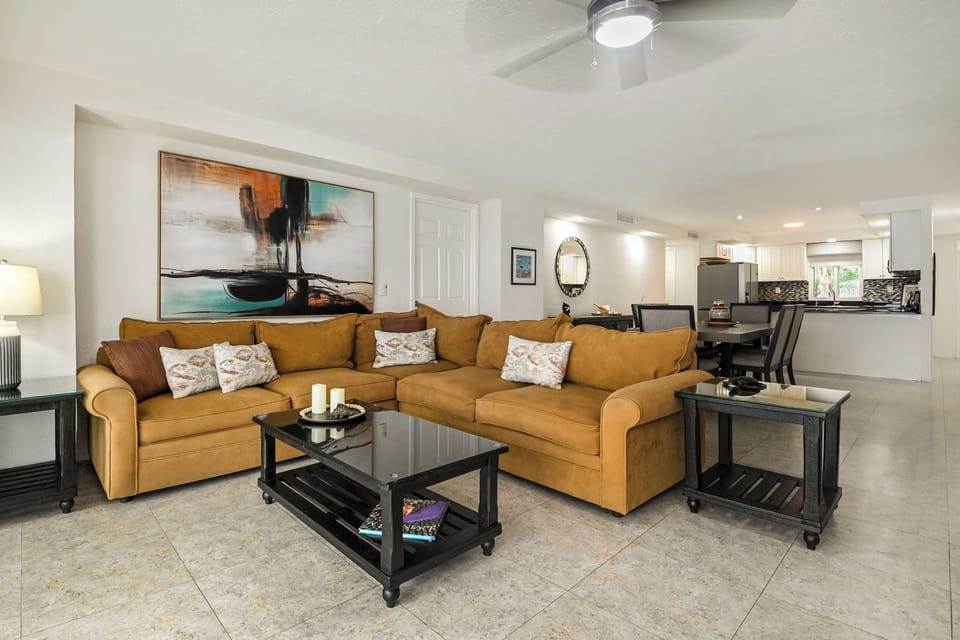 Sink into this spacious sectional sofa where you'll enjoy movie nights and morning coffee in your stylish open-concept living space.
