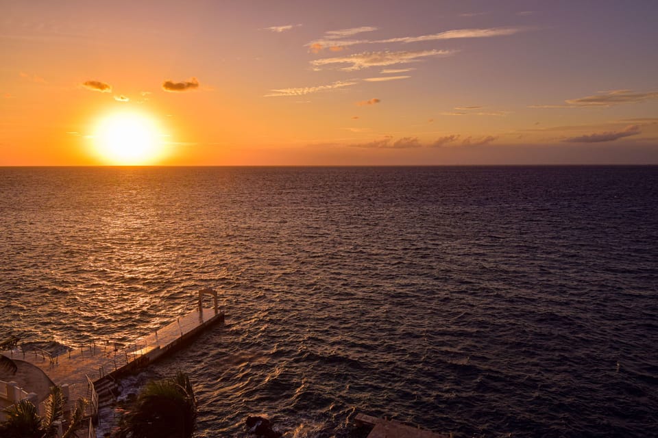 Take a stroll out to the dock for an up close look at the coastal sunset, and dip your toes in the water while sipping a tropical cocktail!