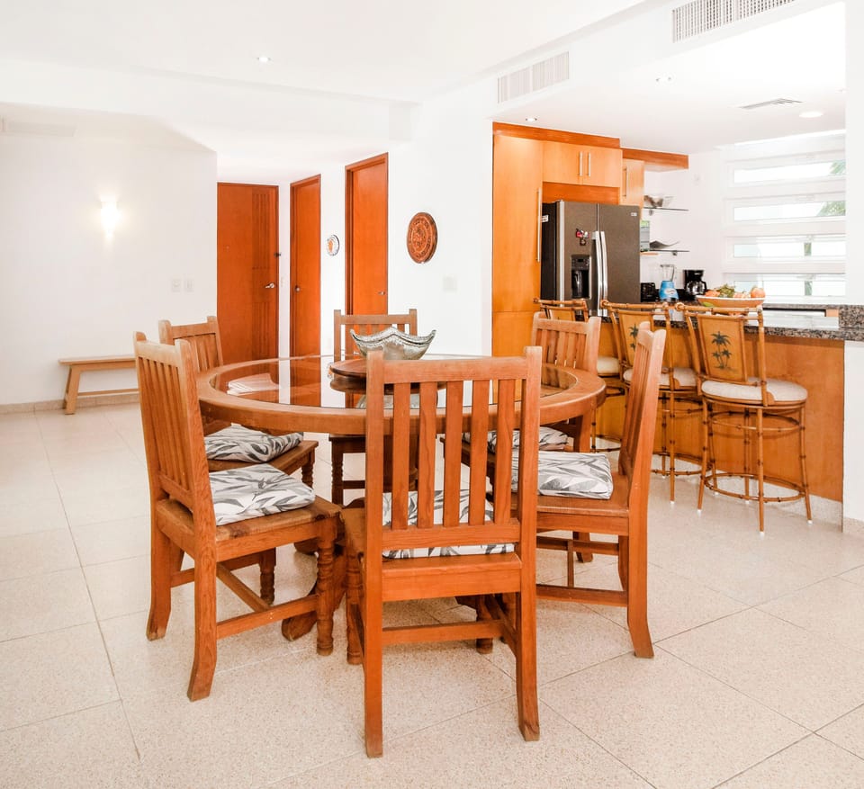 Dining space and bar seating for extra company