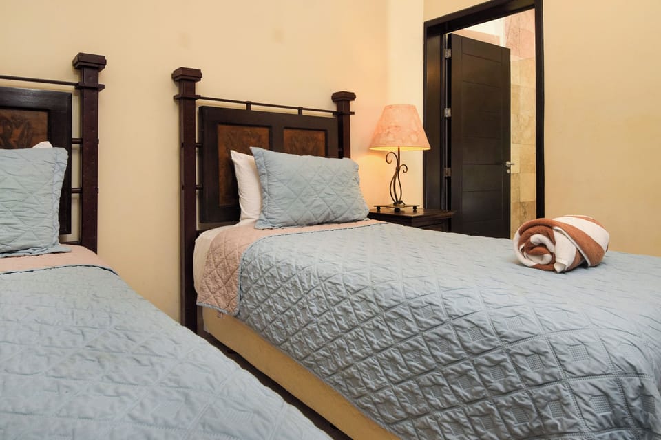 Guest Bedroom 2 - Indulge in a midday siesta before heading out to white sands and sunshine.