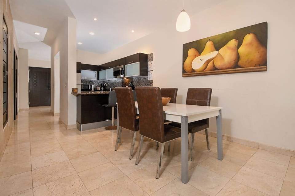 Gather around your dining table for home-cooked meals prepared in the full kitchen—a warm space where every meal feels special.
