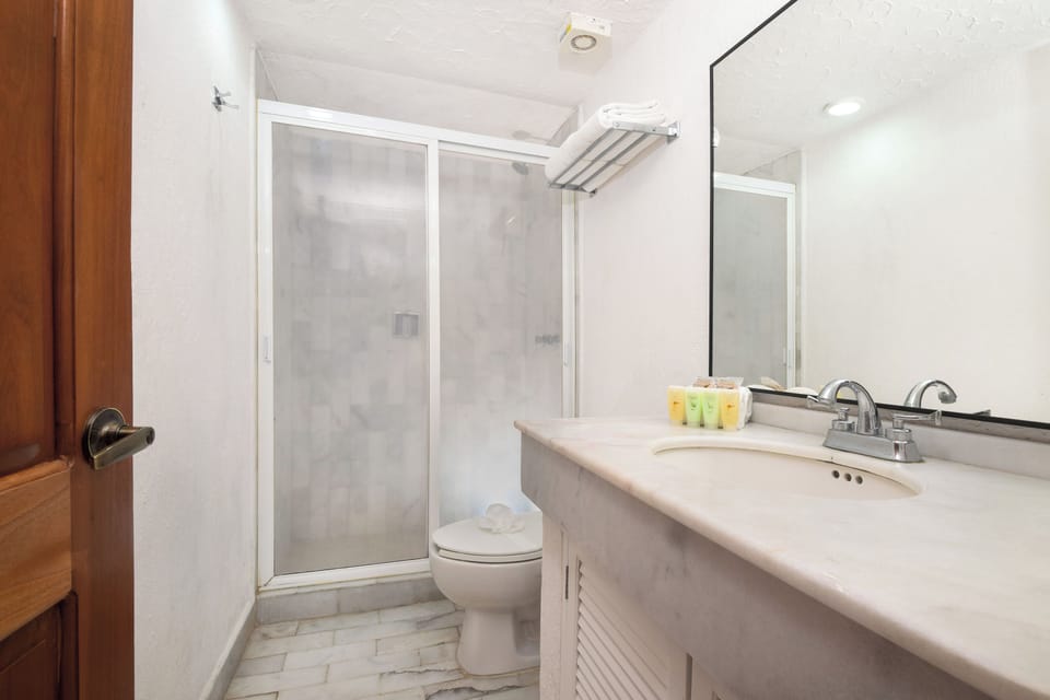Bathrooms feature modern fixtures and plenty of counter space