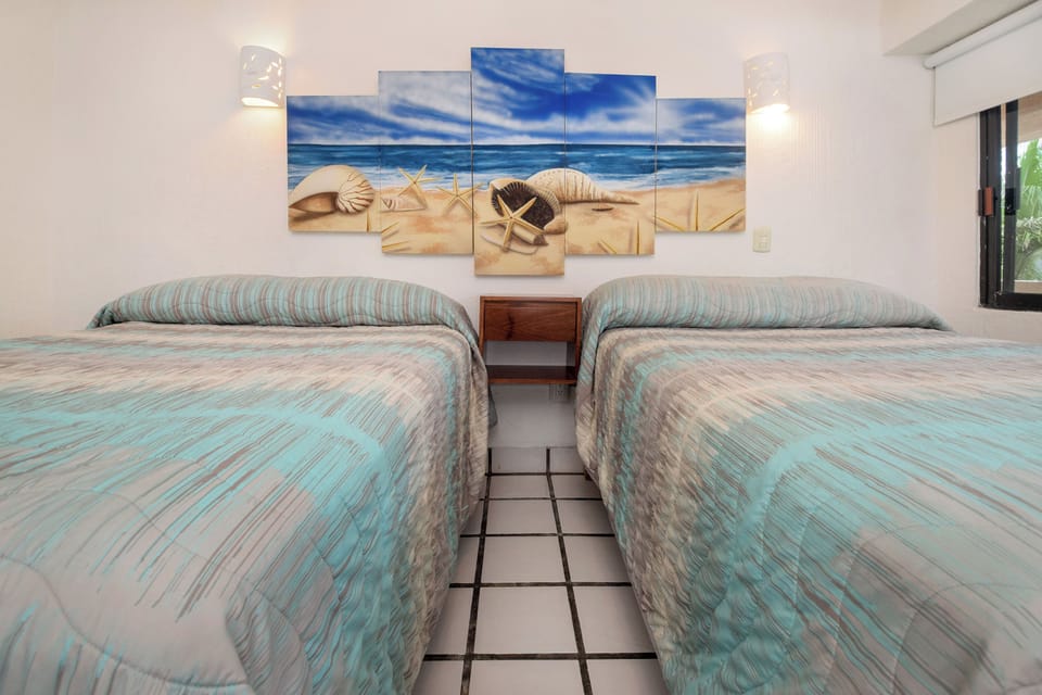 Sleep soundly on plush beds after a day of Caribbean adventures