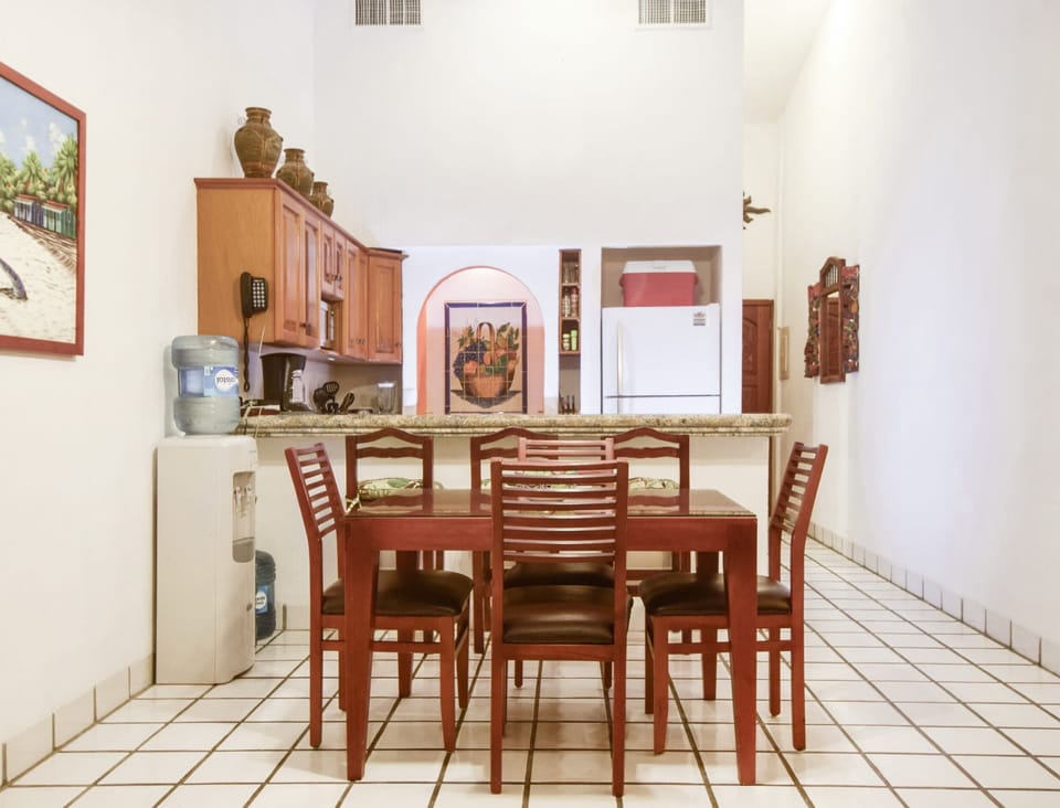 Dining area with vaulted ceilings