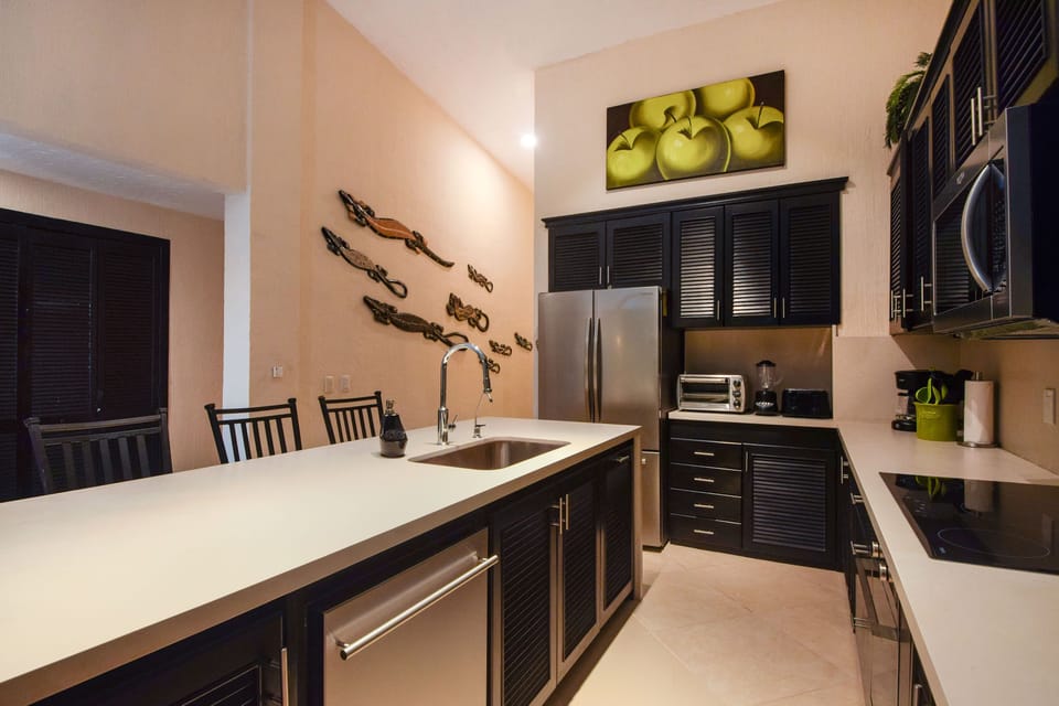 Discover every culinary convenience in our spacious kitchen, featuring every appliance essential in a comfortable stay!