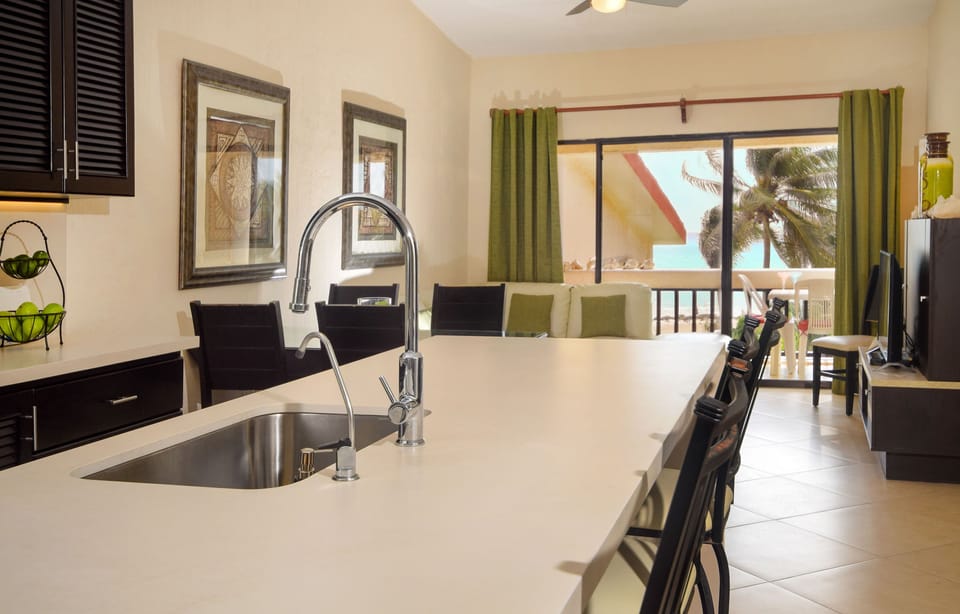 Brew your morning coffee while basking in the coastal, Playa del Carmen backdrop!