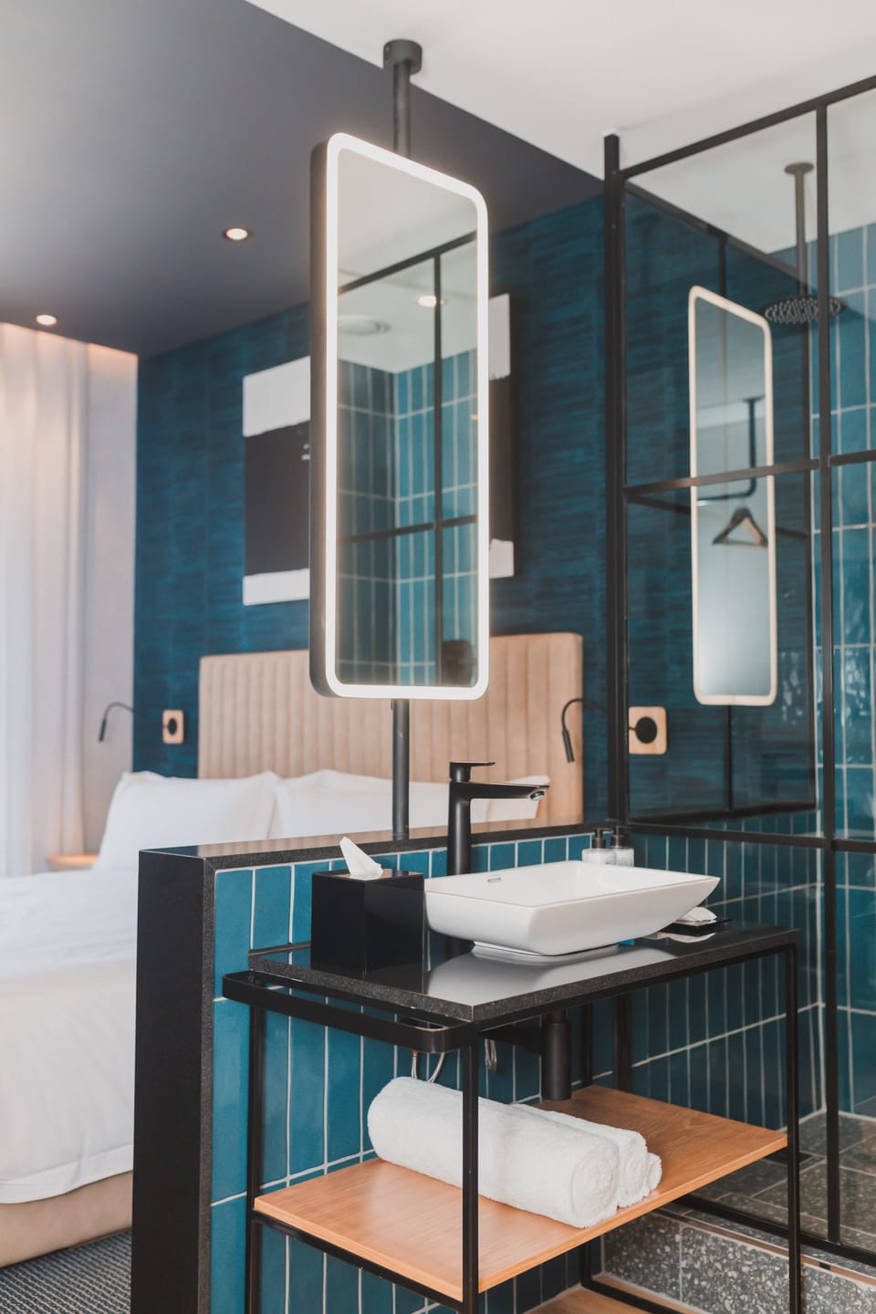 Shower, rainfall showerhead, hair dryer, towels