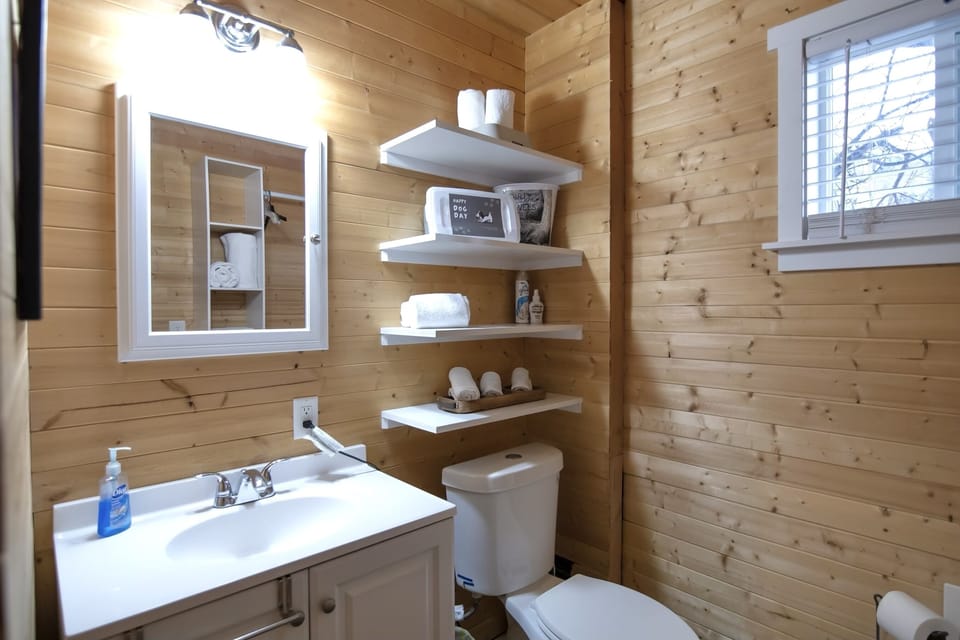 Full bathroom with extra supplies for our furry friends!