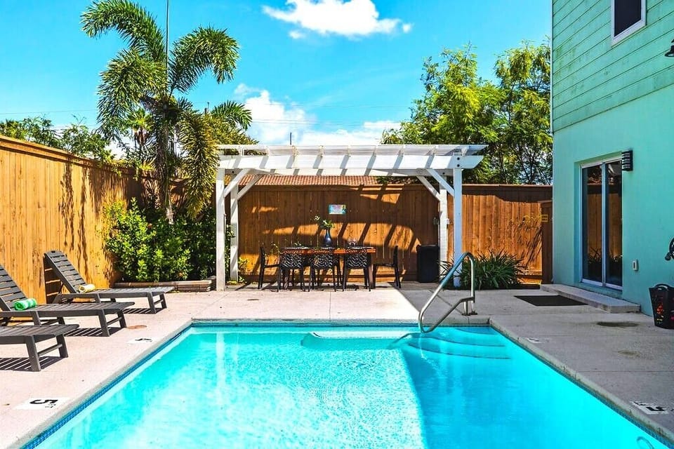 Lounge under the sun, take a refreshing dip in the sparkling pool, and enjoy alfresco meals in the outdoor dining area — everything you need for the perfect day in paradise.