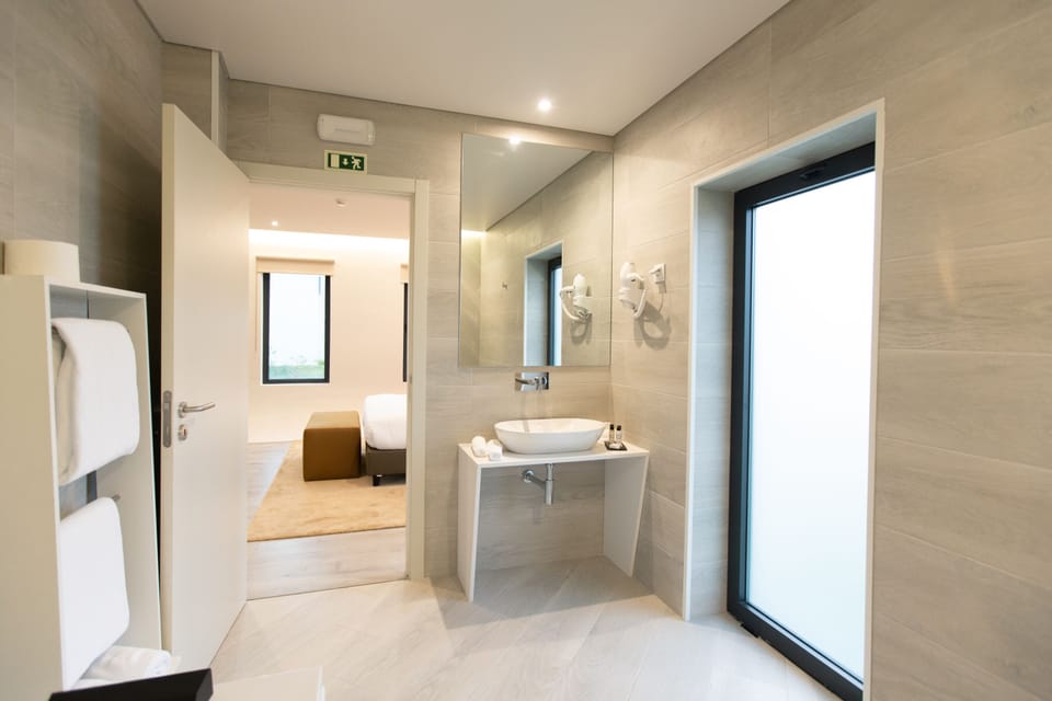 Family Villa | Bathroom | Jetted tub, free toiletries, hair dryer, bathrobes