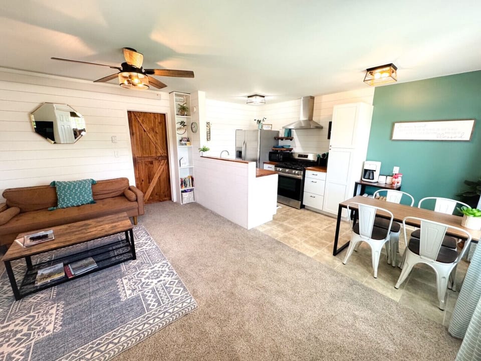 View from the front door - open layout with kitchen, living, and dining for a bright and open space.