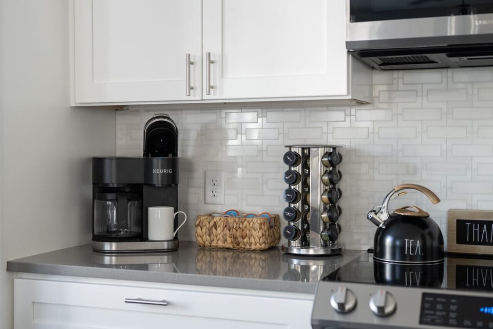 Our fully equipped kitchen has a drip and pod coffee maker, spice rack, tea pot and more