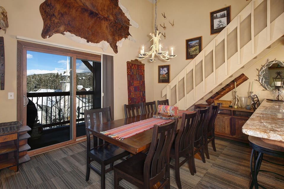 Dining room on the main level with seating for 8 people.