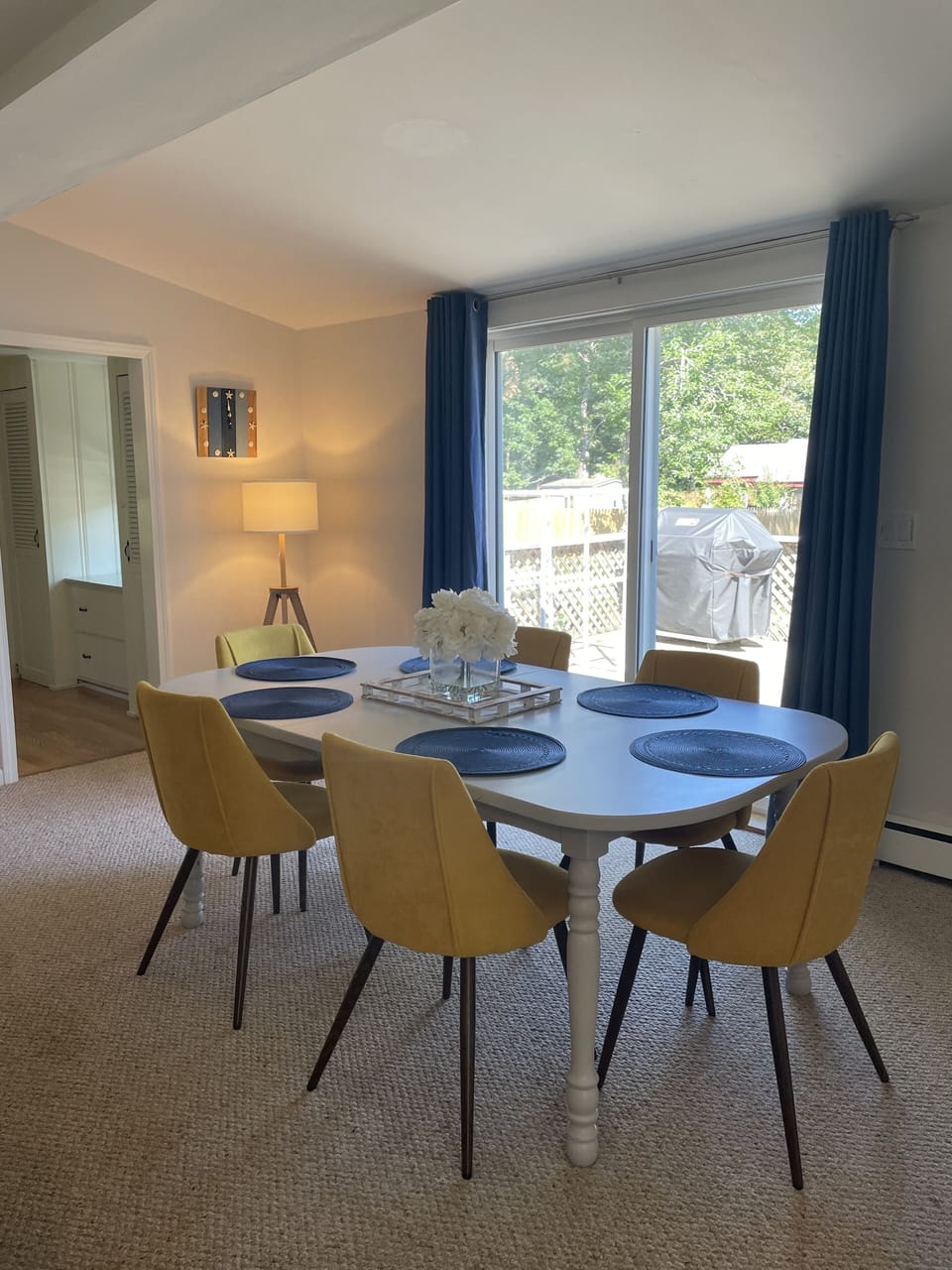 Dining area with a slider to the deck