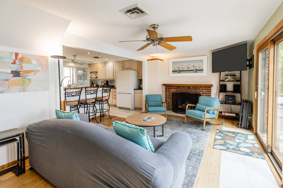 Relax in the family room with the flat screen TV (decorative fireplace).