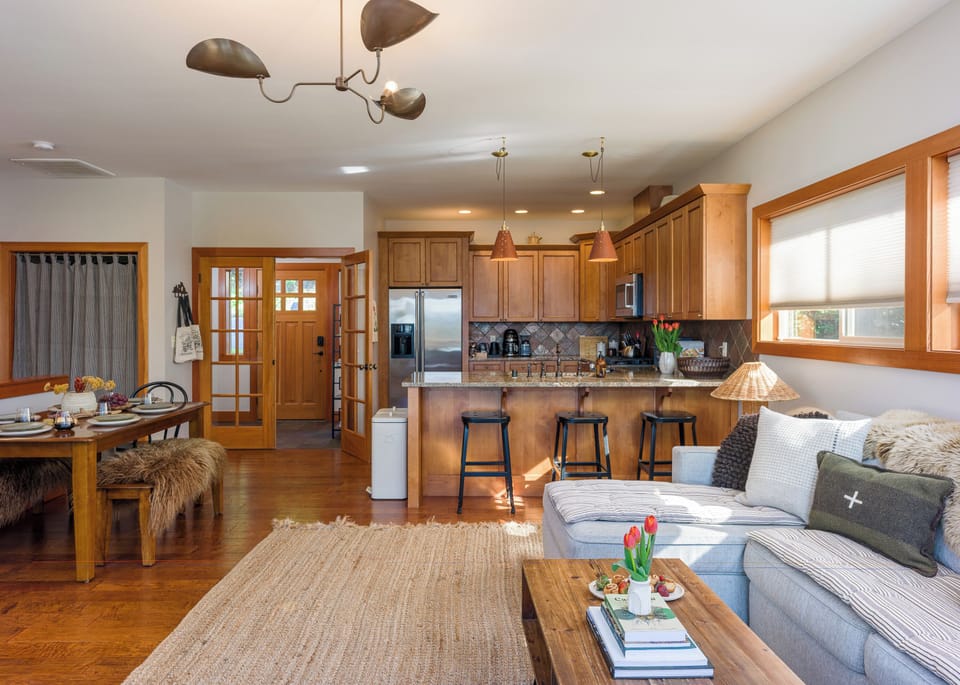 Bright and inviting open-concept living space, perfect for relaxing, sharing meals, and making memories together.