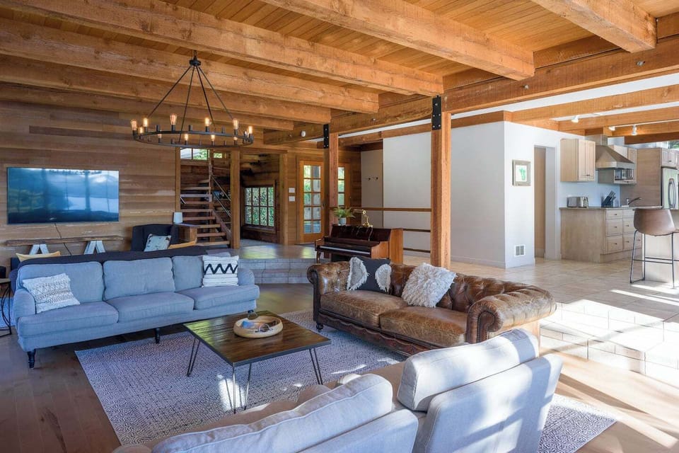 Piano, movies and games...time with friends and family is easy with this extensive living room area.