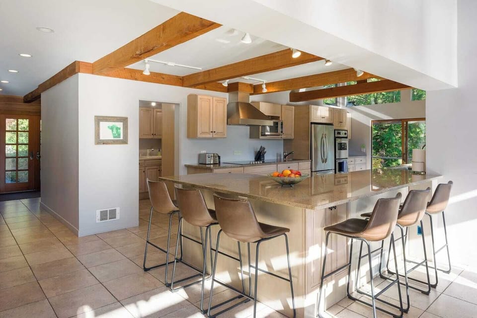 Spacious, fully equipped gourmet kitchen with counter dining.