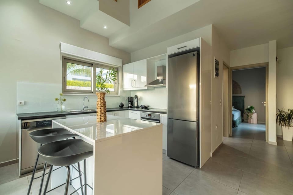 Villa | Private kitchen | Full-size fridge, oven, stovetop, dishwasher