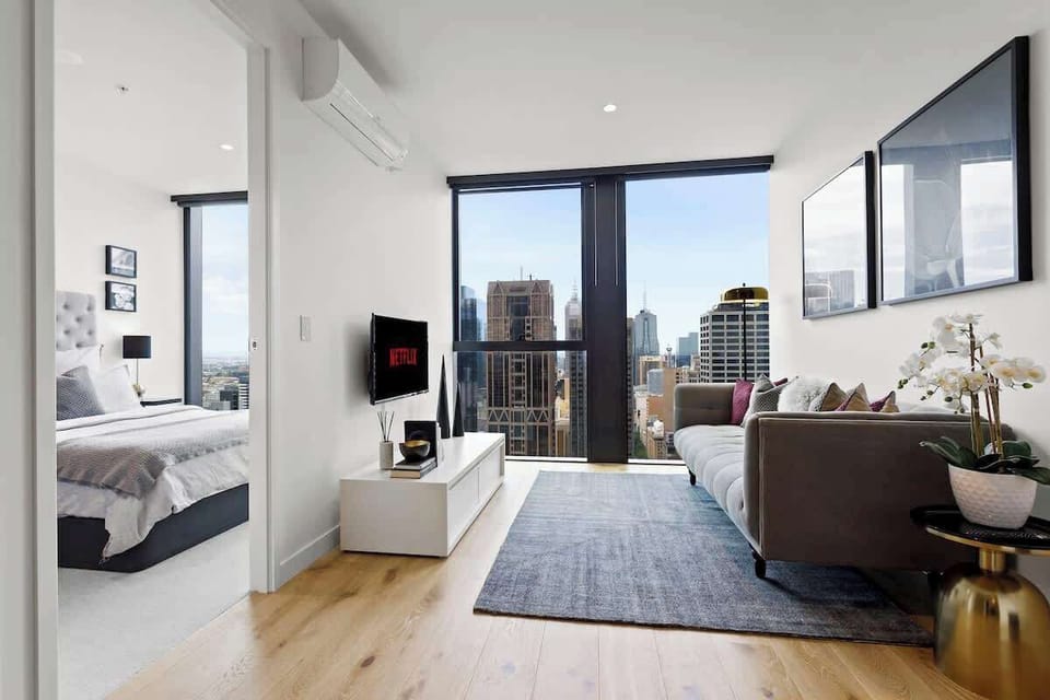 Open-planned living room with flat-screen TV 