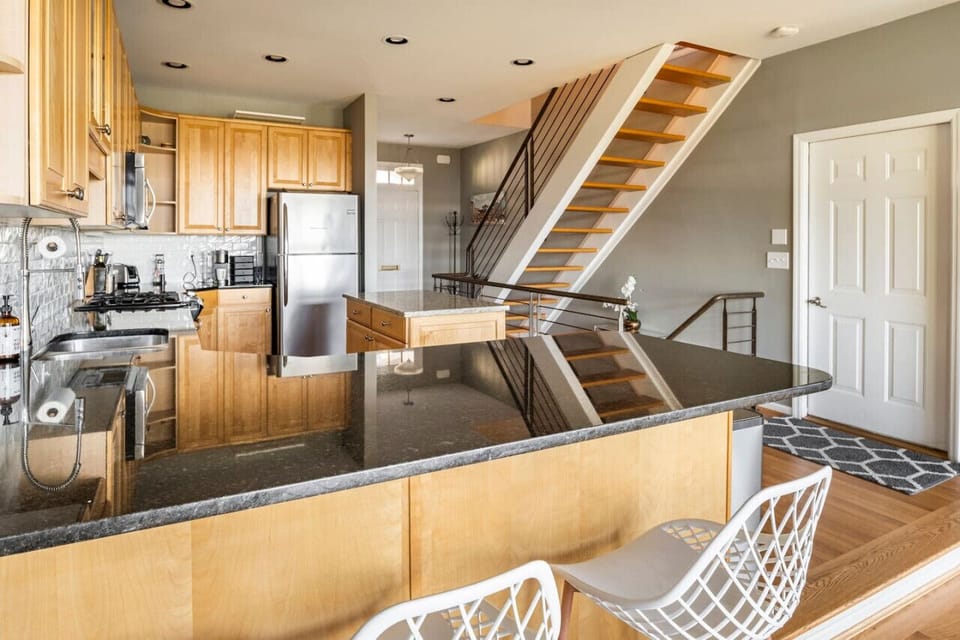 Kitchen area with extra counter seating.