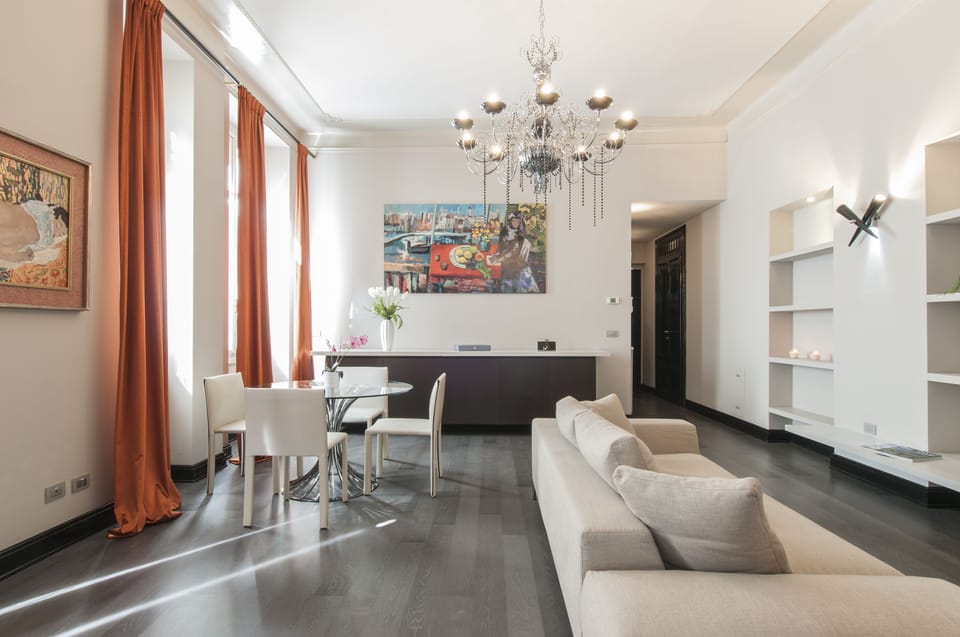 Suite Mozart ( Via Carducci 5) | Living area | 43-inch LCD TV with satellite channels, TV, Netflix