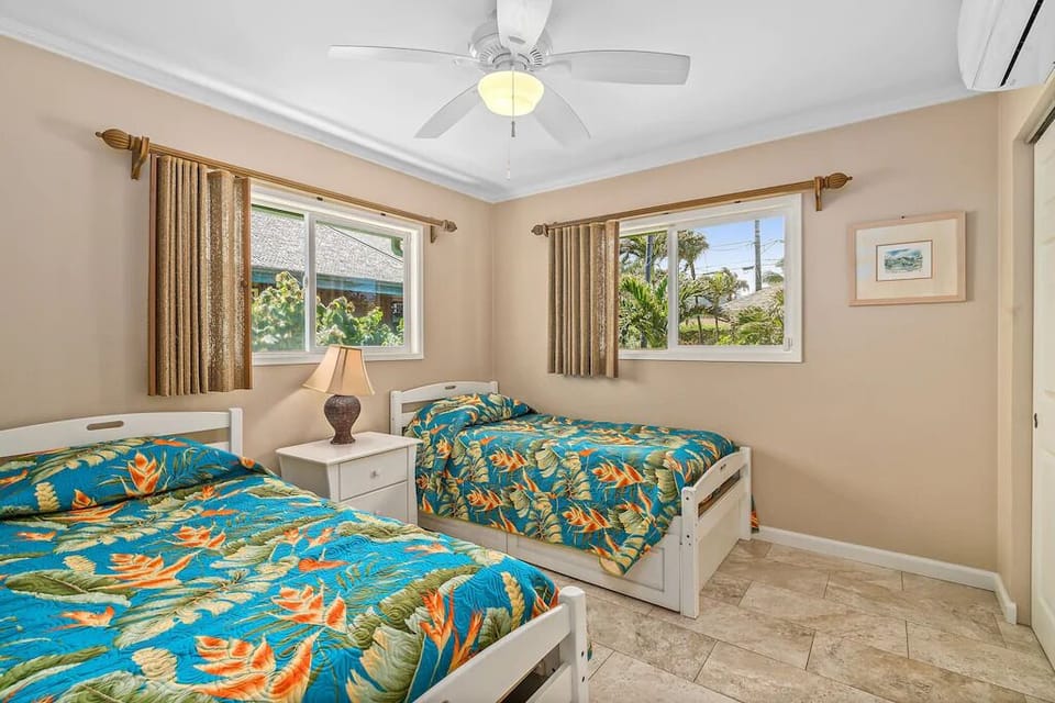 Twin beds with storage. Plenty of room for your luggage. 