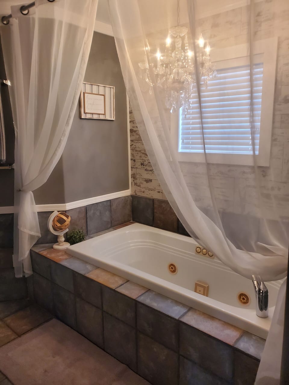 Master bath has a jetted tub for relaxing