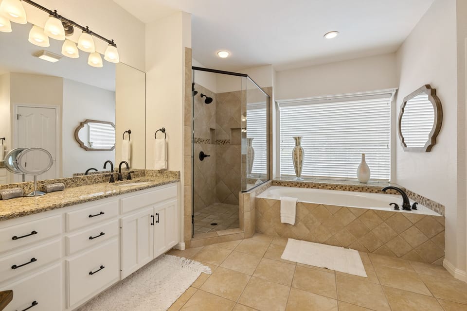 Master Bath with a Soaking Tub and Separate Tile/Glass Shower