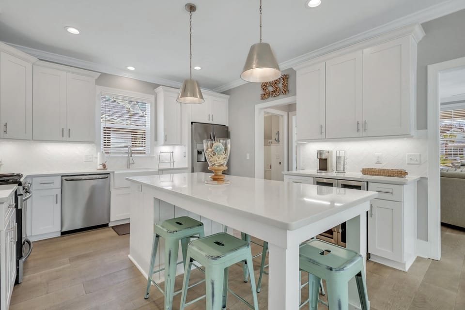 Chef's kitchen with a gas range and plenty of preparation space.