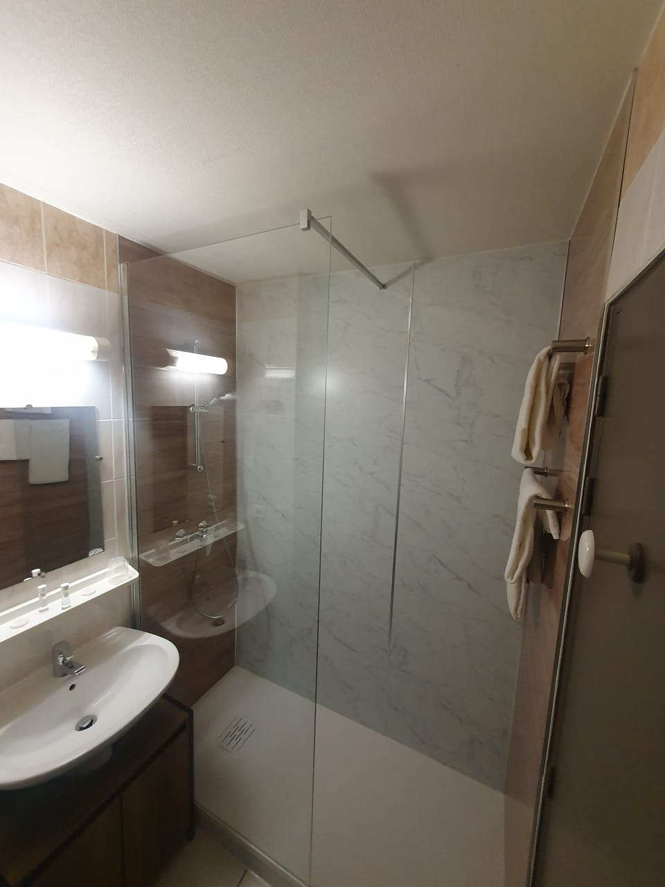 Shower, free toiletries, hair dryer, towels