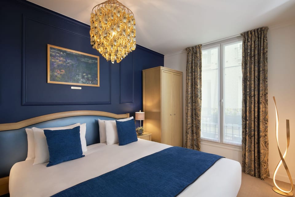 Chambre Deluxe Terrasse | Premium bedding, minibar, in-room safe, individually furnished