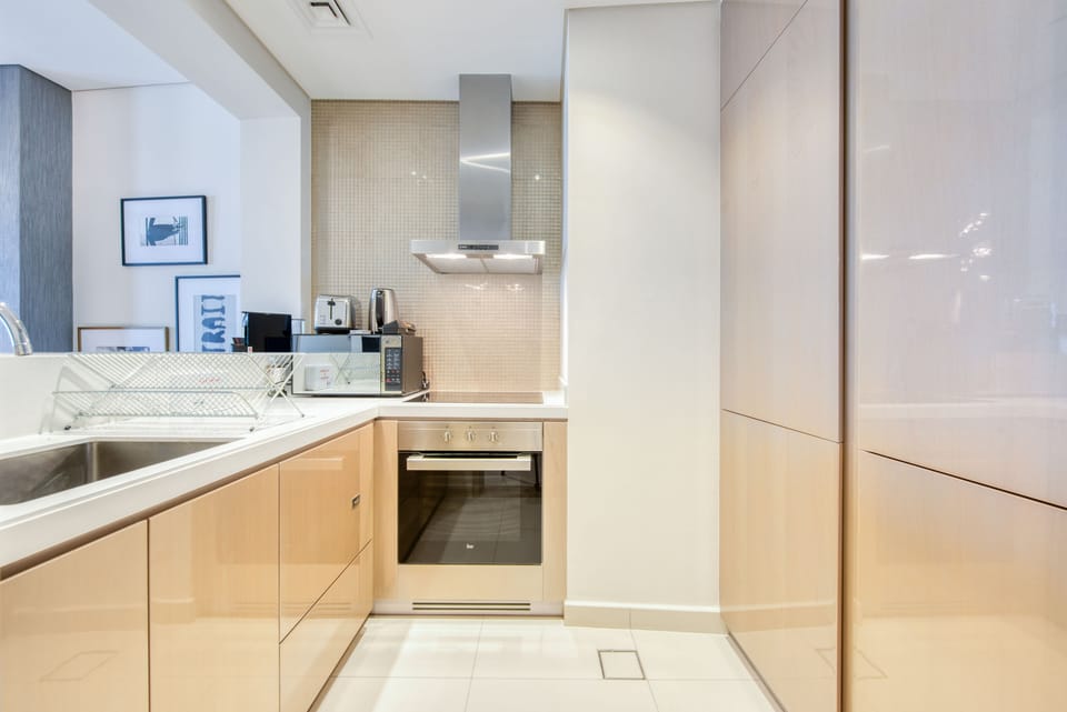 Deluxe Apartment, 1 Bedroom, Non Smoking | Private kitchen | Fridge, microwave, oven, dishwasher