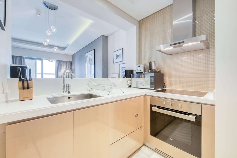 Deluxe Apartment, 1 Bedroom, Non Smoking | Private kitchen | Fridge, microwave, oven, dishwasher