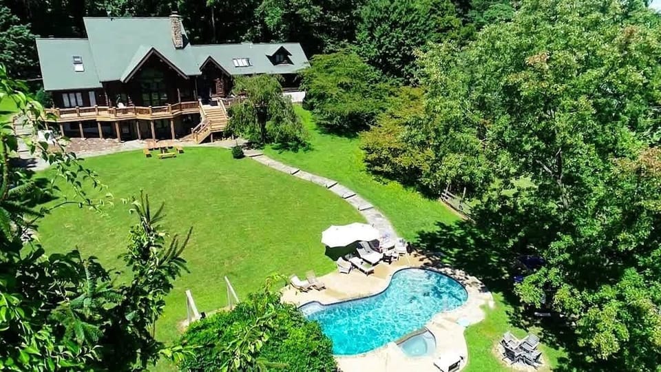 Everything you could want for a fun family or friend getaway! Multiple firepits, Lots of seating on the deck and around the pool. 