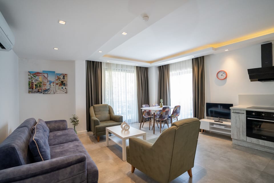 Apartment, 1 Bedroom, Pool View | Living area | 43-inch LCD TV with satellite channels, TV