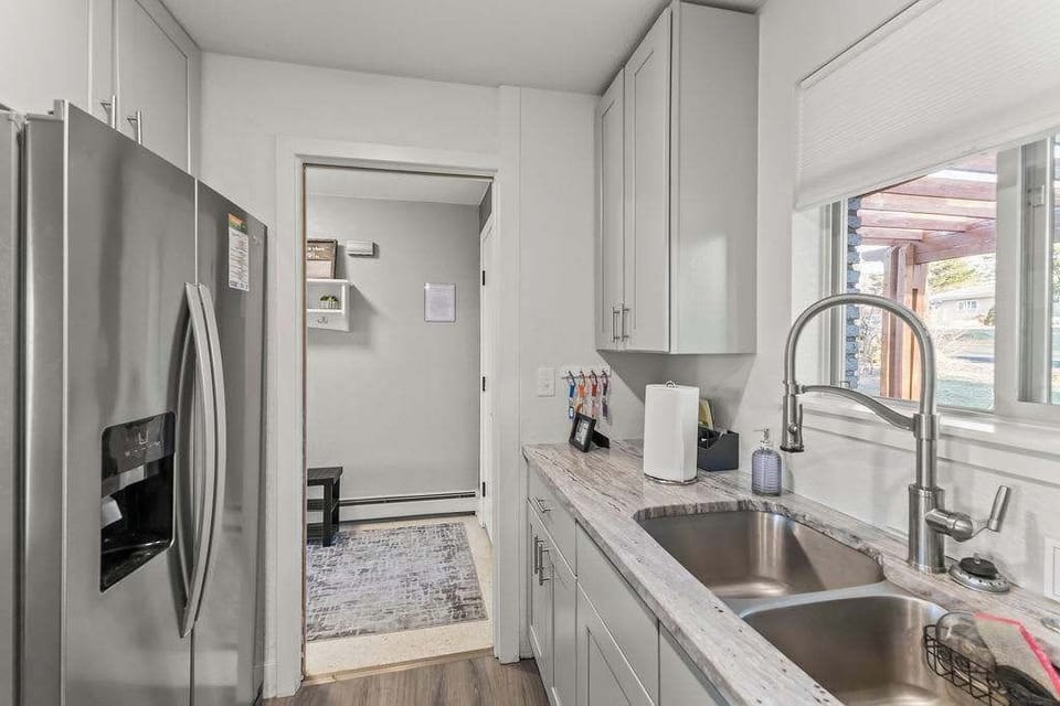 The kitchen is by the front door.